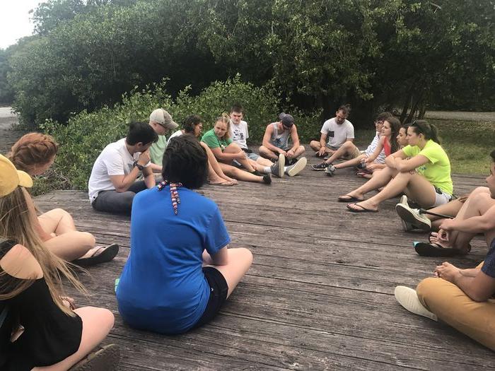 Students sitting on deck